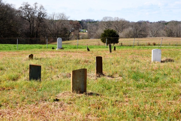 foreground - grave of Ananias Thomas, background -gave of Merriman Little, distant landscape - location of bridge and likely site of Meeting House ford.